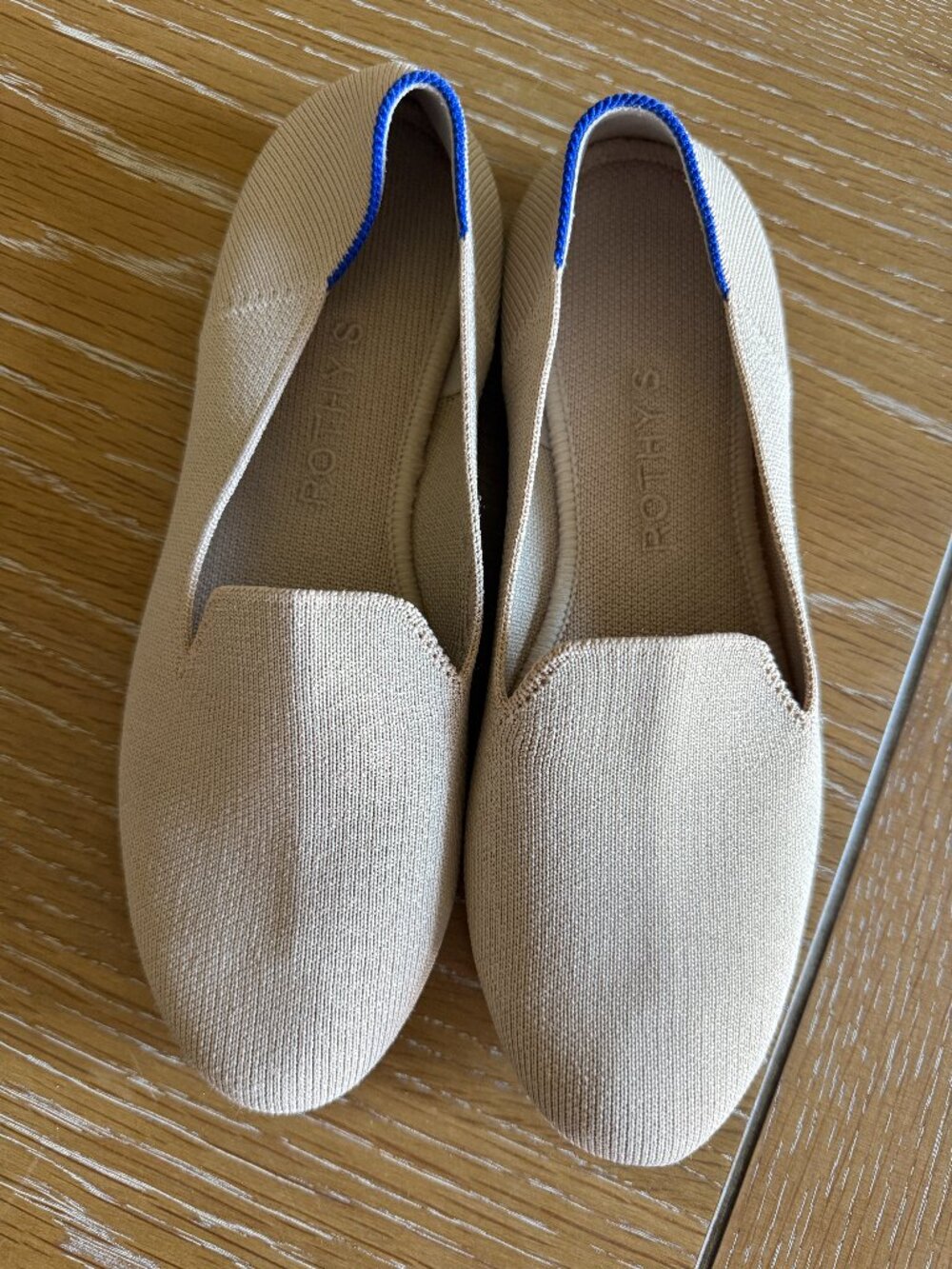 Rothy's Beige Flats with Blue Trim